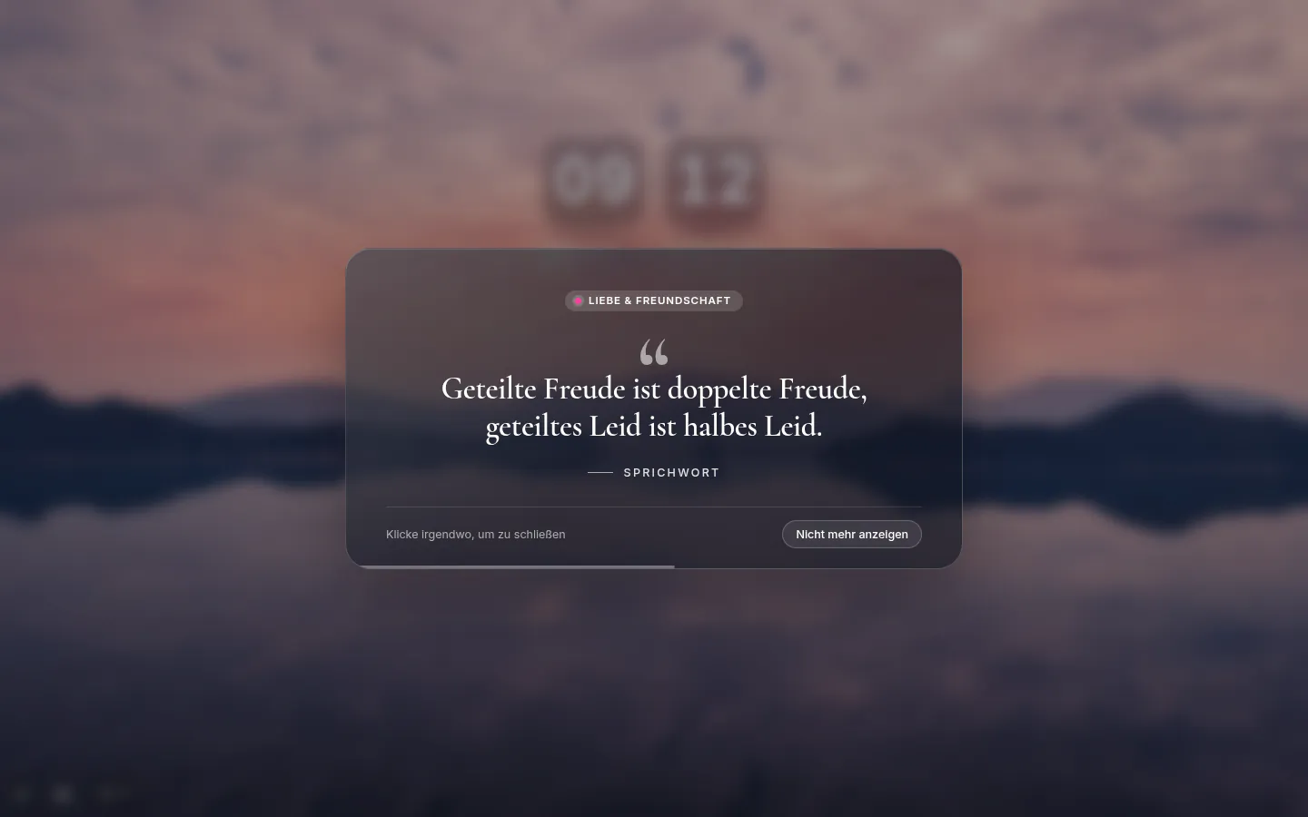 German inspiration popup with a proverb over a blurred wallpaper and a Don’t show again button